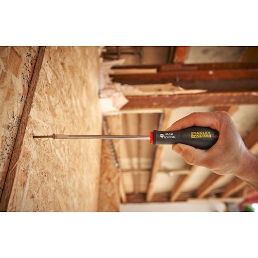 STANLEY® FATMAX® Slotted Flared 6.5 x 150mm Screwdriver Application Action Shot Hand/Person