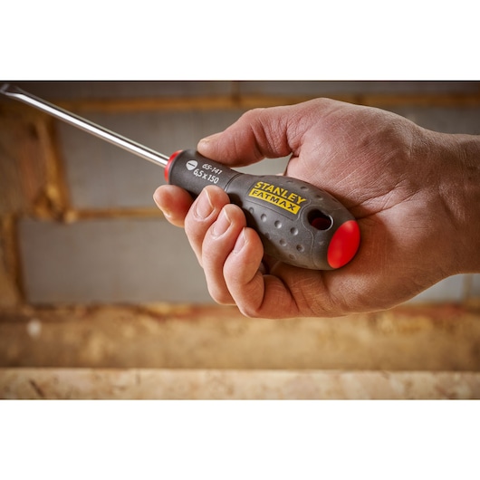 STANLEY® FATMAX® Slotted Flared 6.5 x 150mm Screwdriver Application Action Shot Hand/Person